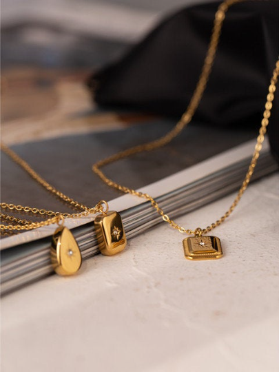 Gold North Star Pendant Necklaces