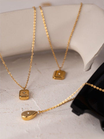 Gold North Star Pendant Necklaces